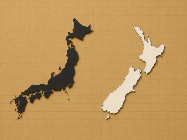 Paper cut-outs of Japan and New Zealand side by side, as in Size It Up Geography