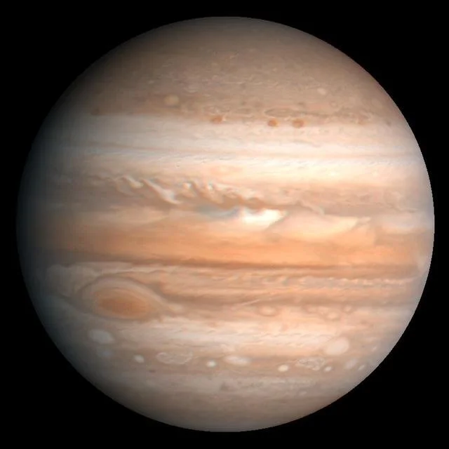 Voyager photograph of Jupiter showing cloud bands and the Great Red Spot.